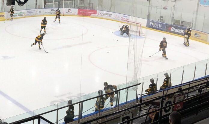 Warm up before the Olds Grizzlys battled the Lloydminster Bobcats on January 31, 2025 (Galen Hartviksen, mymountainviewnow.com staff)