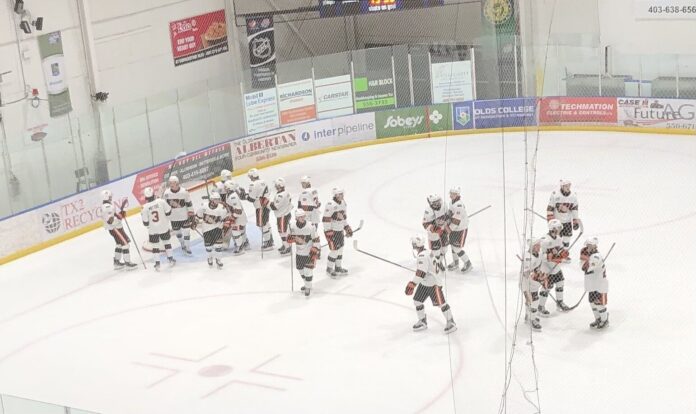 Head Coach Jeff Woywitka's Lloydminster Bobcats win in Olds on January 31st, 2025 (Galen Hartviksen, mymountainviewnow.com staff)