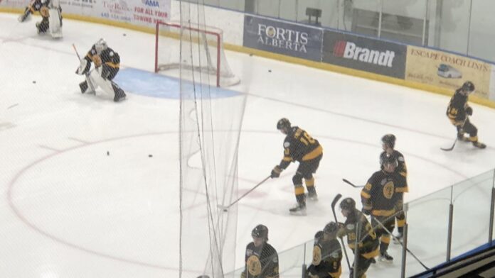 Aiden Knutson (#18) of the Olds Grizzlys warms up prior to the final home game of his junior hockey career on March 14, 2025. (Galen Hartviksen, mymountainviewnow.com staff)