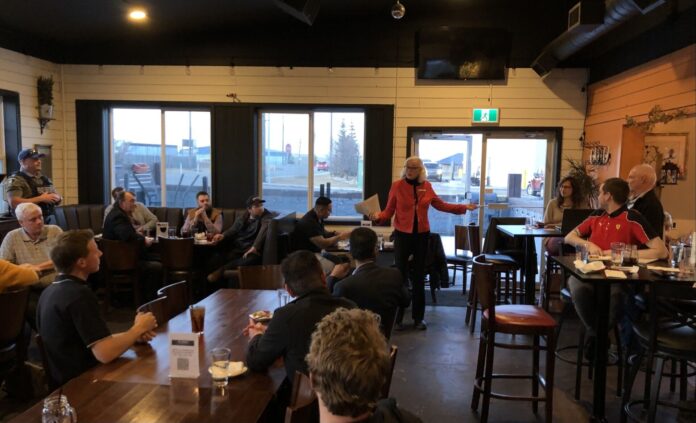 Alexandra Ross, the Town of Didsbury's Economic Development Officer and Strategic Operations Officer speaks at a business networking event on March 7, 2025. (Galen Hartviksen, mymountainviewnow.com staff)