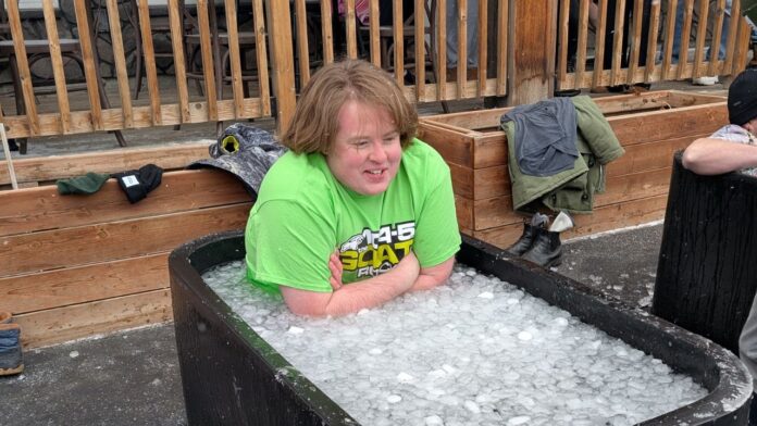 Ris Schultz from Vista Radio takes the Polar Plunge on March 15, 2025. (Supplied, Vista Radio)