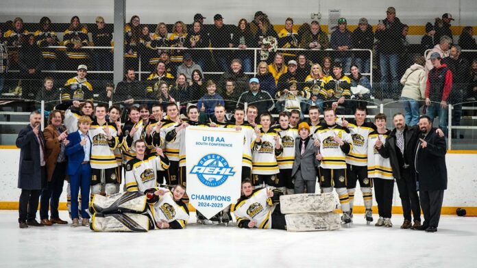 U18 AA Olds Grizzlys celebrate after winning the South Conference championship banner on March 16, 2025. (Supplied, U18 AA Olds Grizzlys - Photo Credit: Ryan James Photography)